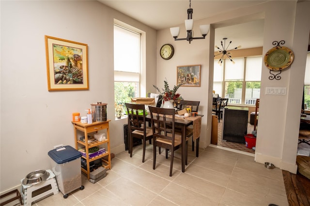 3344 Giles Pl, Bronx, NY 10463 - tiled dining space featuring a chandelier and plenty of natural light