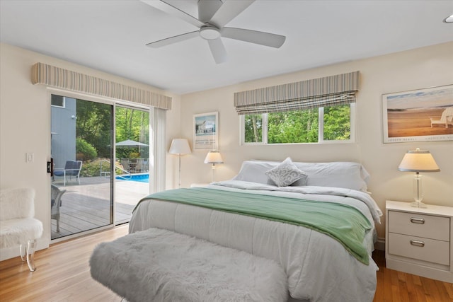 41 Park Cir, Quogue, NY 11959 - bedroom featuring access to exterior, wood finished floors, and a ceiling fan