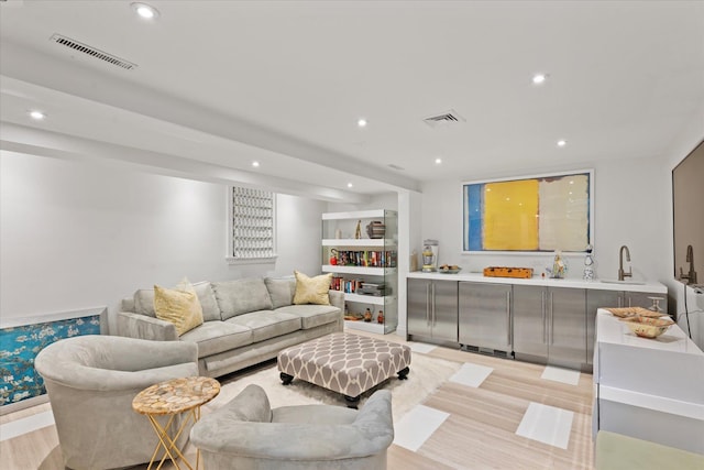 41 Park Cir, Quogue, NY 11959 - living room featuring light wood-type flooring and recessed lighting