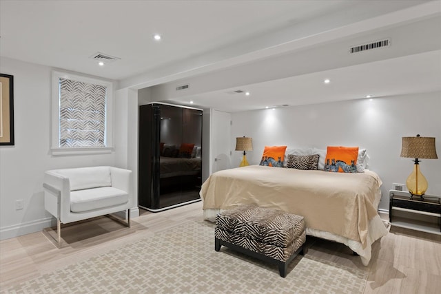 41 Park Cir, Quogue, NY 11959 - bedroom with recessed lighting and light wood-style floors