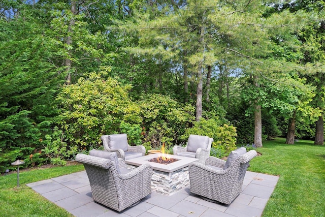 41 Park Cir, Quogue, NY 11959 - view of patio featuring an outdoor fire pit