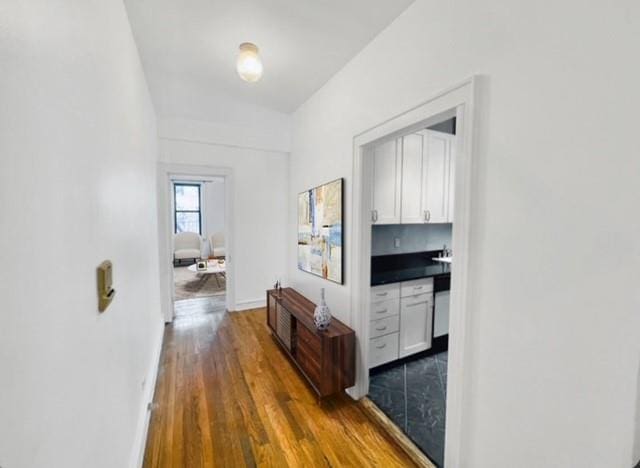 41-42 42nd St Unit 4L, Sunnyside, NY 11104 - hallway with wood finished floors and baseboards
