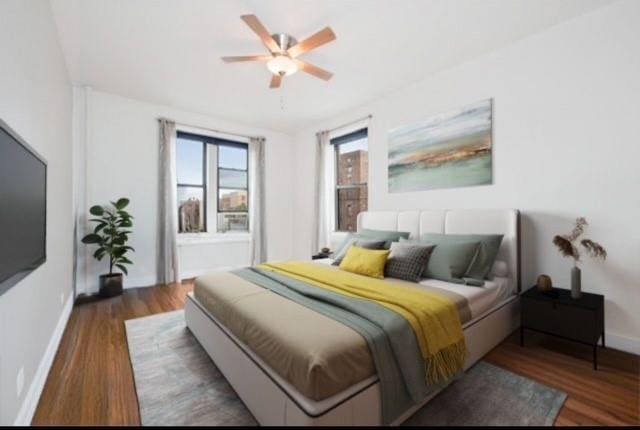 41-42 42nd St Unit 4L, Sunnyside, NY 11104 - bedroom featuring wood finished floors and ceiling fan