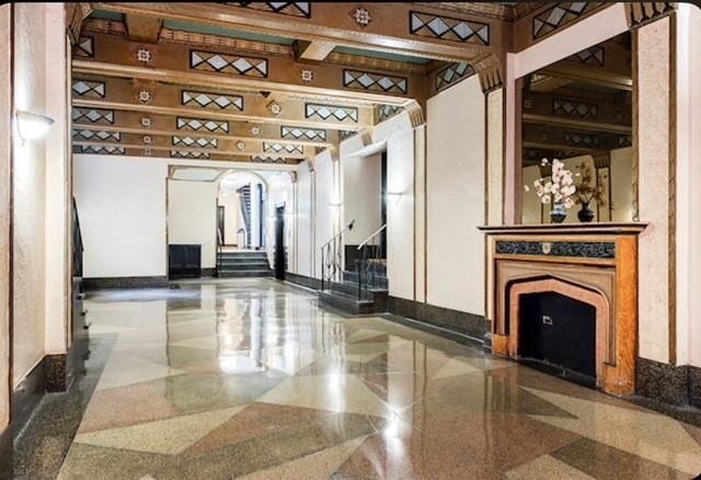 41-42 42nd St Unit 4L, Sunnyside, NY 11104 - common area featuring stairway and a towering ceiling
