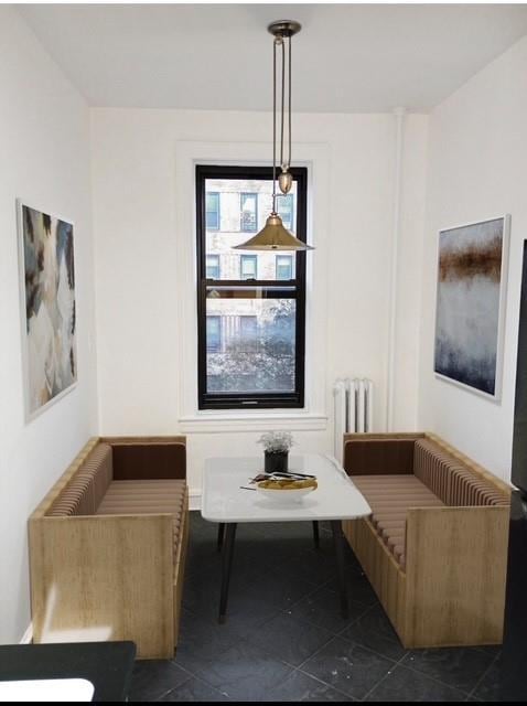 41-42 42nd St Unit 4L, Sunnyside, NY 11104 - bathroom featuring radiator heating unit and tile patterned floors