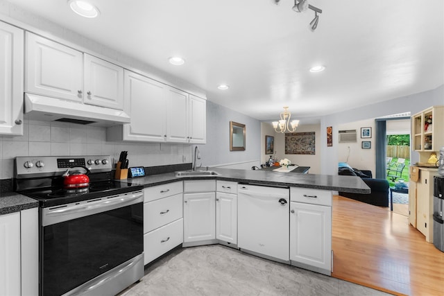 5 Rose Ests Unit 2, Walden, NY 12586 - kitchen with electric range, dishwasher, under cabinet range hood, a peninsula, and a chandelier