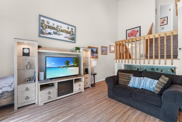 5 Rose Ests Unit 2, Walden, NY 12586 - living area featuring wood finished floors and a towering ceiling