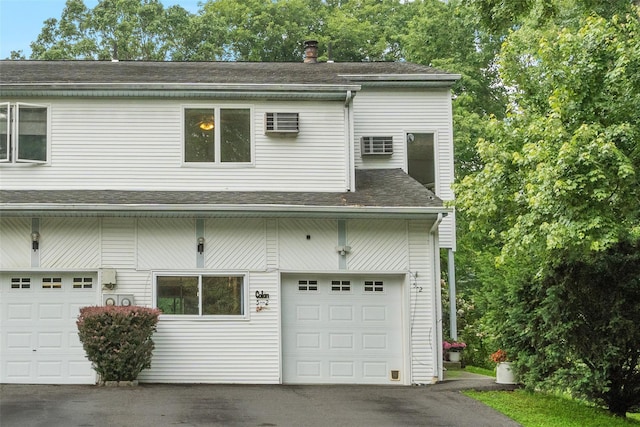 5 Rose Ests Unit 2, Walden, NY 12586 - view of front of property featuring a garage, roof with shingles, and driveway