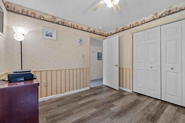 5 Rose Ests Unit 2, Walden, NY 12586 - interior space with a wainscoted wall, wallpapered walls, wood finished floors, and ceiling fan