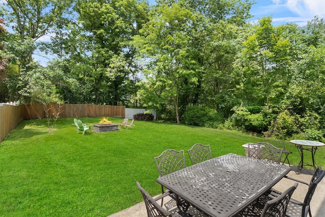 5 Rose Ests Unit 2, Walden, NY 12586 - fenced backyard with a fire pit and outdoor dining area