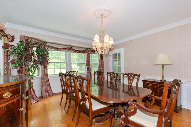 1 Ravine Rd, Great Neck, NY 11023 - dining space with a chandelier, light wood-type flooring, ornamental molding, and a wainscoted wall