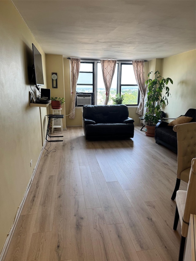 3121 Middletown Rd Unit 7G, Bronx, NY 10461 - living room with wood finished floors and cooling unit