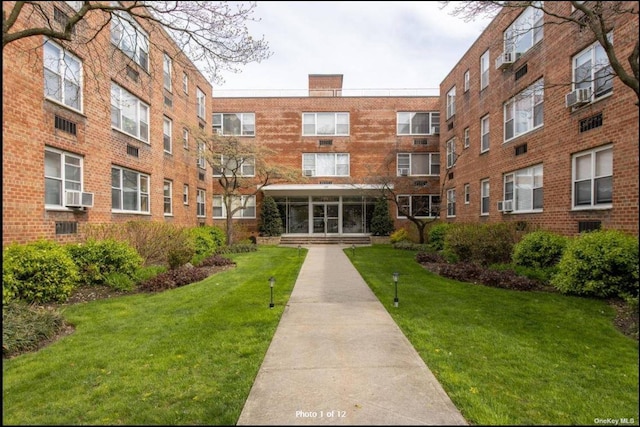 125 Main St Unit 2H, Port Washington, NY 11050 - view of apartment building / complex with cooling unit