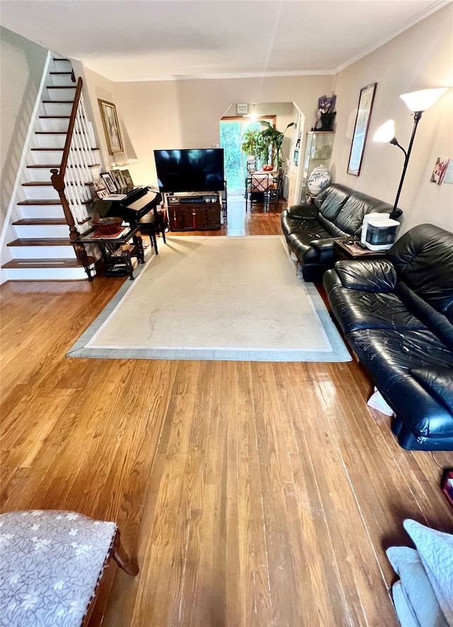 4328 195th St, Flushing, NY 11358 - living area featuring wood-type flooring, stairs, and ornamental molding