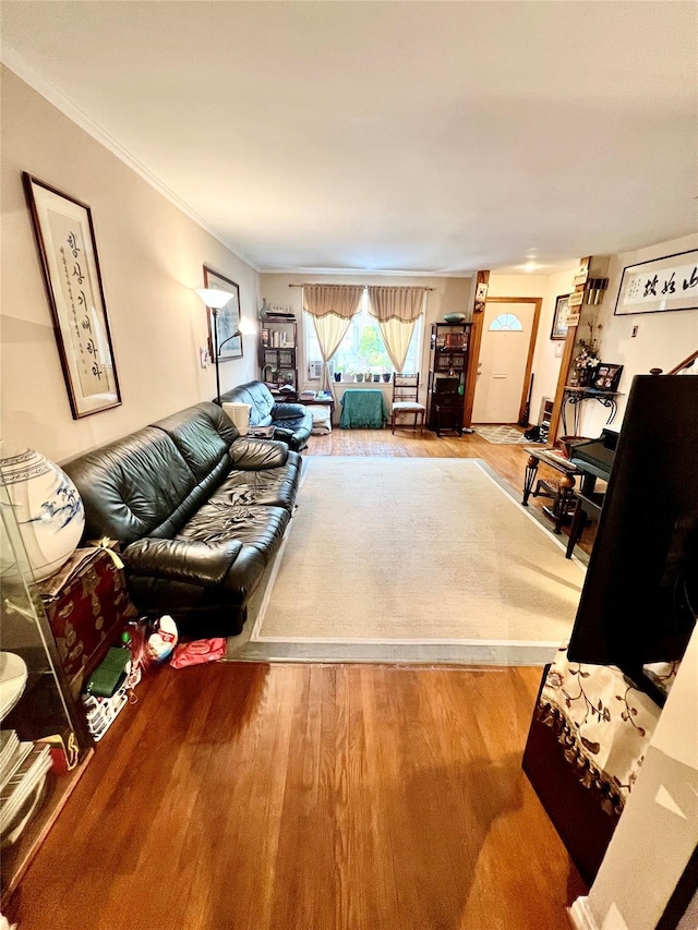 4328 195th St, Flushing, NY 11358 - living room featuring wood finished floors and crown molding