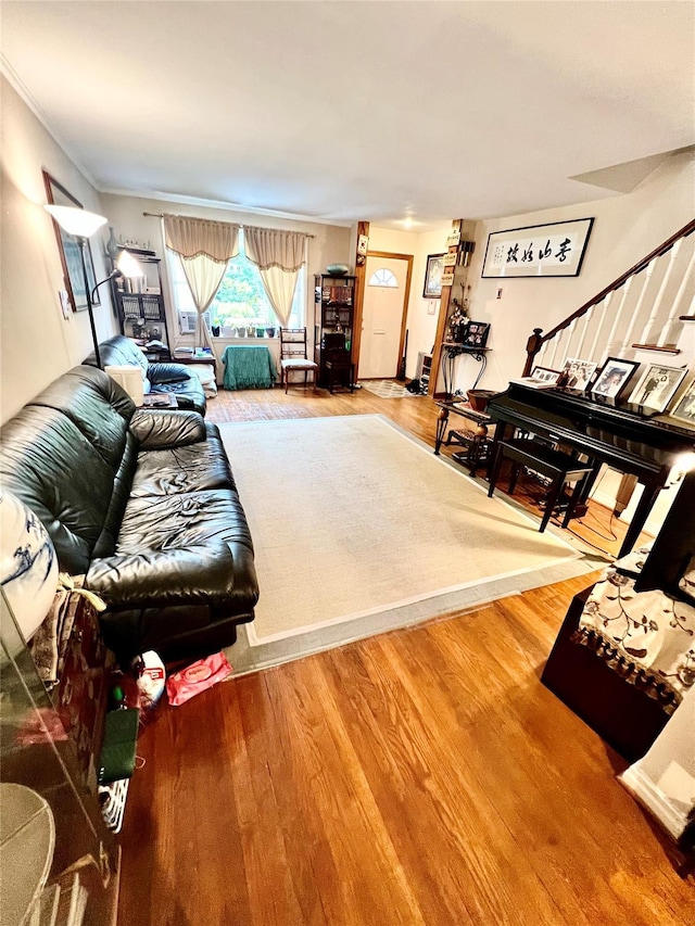 4328 195th St, Flushing, NY 11358 - living area featuring wood finished floors and crown molding