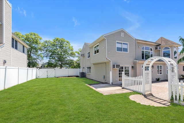 2080 Beech St, Wantagh, NY 11793 - rear view of property with a fenced backyard, a patio area, and a gate