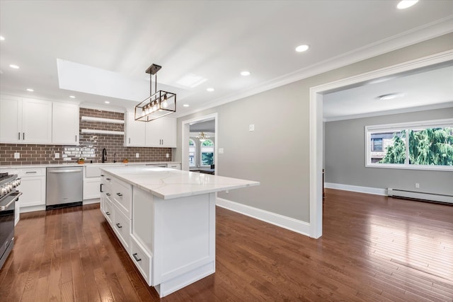 2080 Beech St, Wantagh, NY 11793 - kitchen featuring appliances with stainless steel finishes, a baseboard radiator, dark wood-type flooring, decorative backsplash, and crown molding