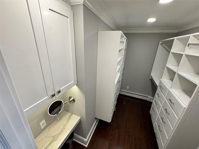2080 Beech St, Wantagh, NY 11793 - walk in closet with dark wood-type flooring and a baseboard radiator