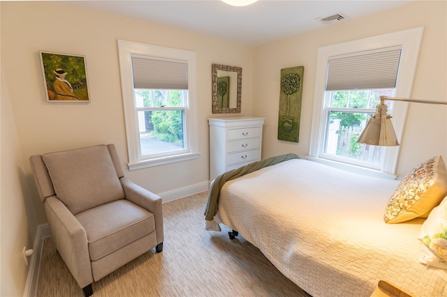 477 Archer St, Freeport, NY 11520 - carpeted bedroom with multiple windows