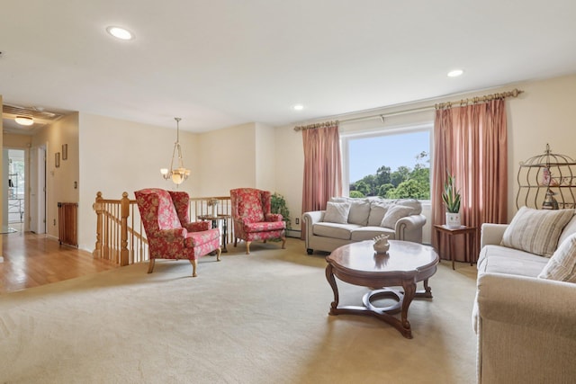 3 Hoyt Ct, Stony Point, NY 10980 - living area with plenty of natural light, recessed lighting, a chandelier, light colored carpet, and a baseboard radiator