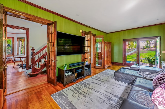 33 Ridge Rd, Ardsley, NY 10502 - living room featuring ornamental molding, stairway, wood-type flooring, and wooden walls