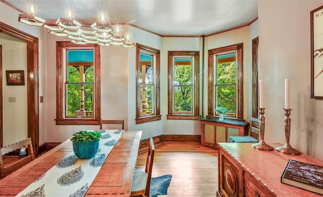 33 Ridge Rd, Ardsley, NY 10502 - dining room featuring plenty of natural light, hardwood / wood-style flooring, and crown molding