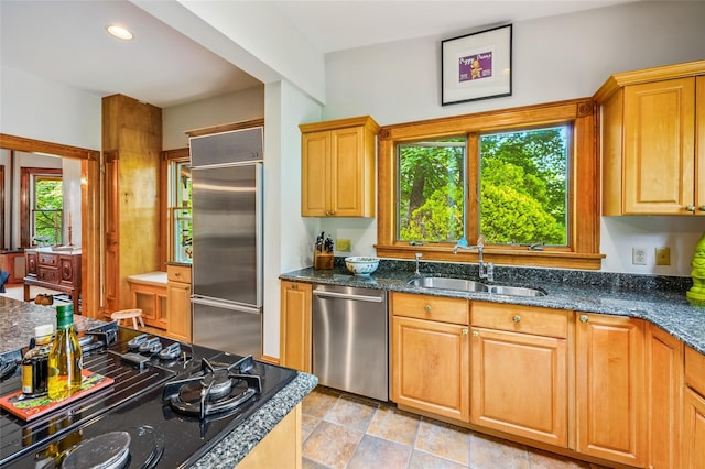 33 Ridge Rd, Ardsley, NY 10502 - kitchen with stainless steel appliances and dark stone countertops