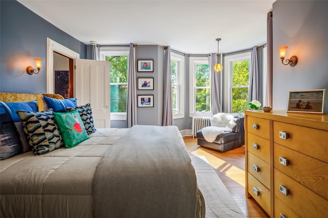 33 Ridge Rd, Ardsley, NY 10502 - bedroom with wood finished floors and radiator