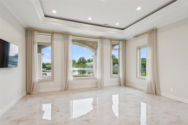 1190 Harbor Rd, Hewlett Harbor, NY 11557 - spare room with crown molding, a raised ceiling, marble tiled floors, recessed lighting, and a water view