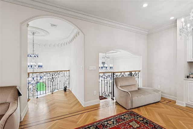 1190 Harbor Rd, Hewlett Harbor, NY 11557 - living area with a chandelier, arched walkways, crown molding, recessed lighting, and an upstairs landing