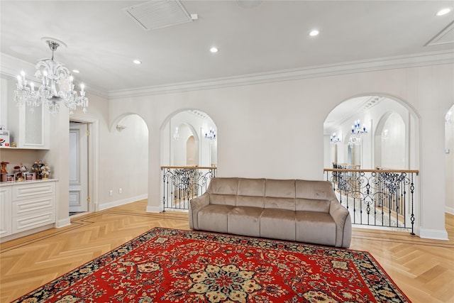 1190 Harbor Rd, Hewlett Harbor, NY 11557 - living room with ornamental molding, recessed lighting, arched walkways, and a chandelier