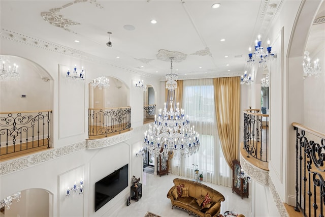 1190 Harbor Rd, Hewlett Harbor, NY 11557 - detailed view of a chandelier, arched walkways, recessed lighting, and crown molding