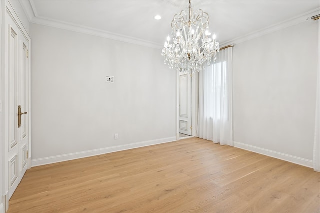 1190 Harbor Rd, Hewlett Harbor, NY 11557 - unfurnished room with light wood-type flooring, a chandelier, and crown molding