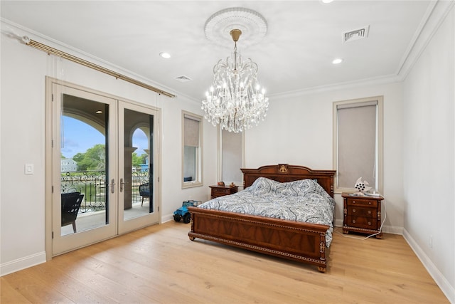 1190 Harbor Rd, Hewlett Harbor, NY 11557 - bedroom with french doors, a chandelier, access to outside, light wood-style floors, and ornamental molding