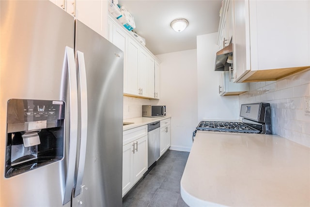 6109 39th Ave Unit J3, Woodside, NY 11377 - kitchen with stainless steel appliances, backsplash, range hood, light countertops, and white cabinets