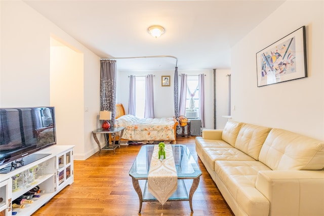 6109 39th Ave Unit J3, Woodside, NY 11377 - bedroom with light wood-type flooring and cooling unit