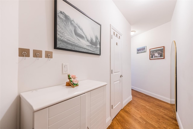 6109 39th Ave Unit J3, Woodside, NY 11377 - hallway featuring light wood-style flooring and baseboards