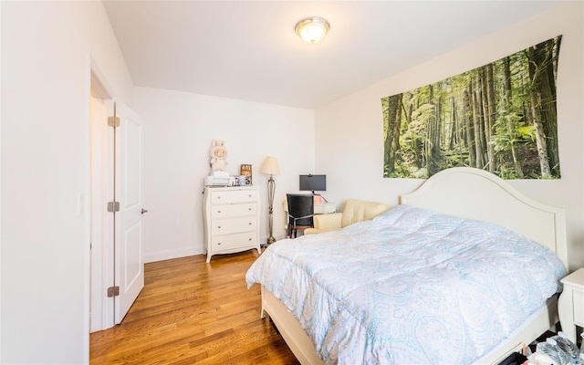 6109 39th Ave Unit J3, Woodside, NY 11377 - bedroom with light wood-style floors and baseboards