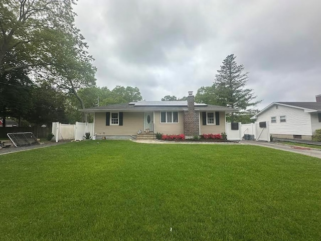 62 S Howell Ave, Centereach, NY 11720 - ranch-style house with a chimney and a gate