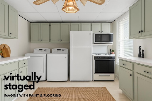 16 King St, Port Jervis, NY 12771 - washroom featuring a ceiling fan and washer and clothes dryer