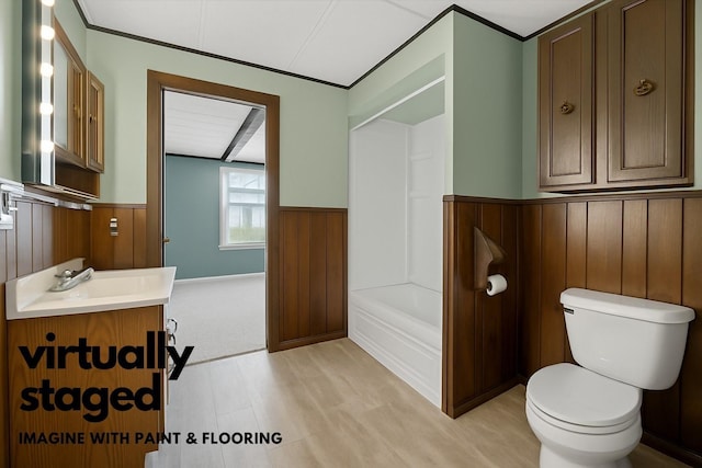 16 King St, Port Jervis, NY 12771 - bathroom with wainscoting, vanity, a bathtub, and wood walls