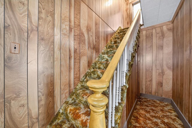 16 King St, Port Jervis, NY 12771 - stairway with wood walls and carpet