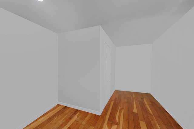 27 Dana Ave, Mastic, NY 11950 - additional living space with light wood-style floors and baseboards