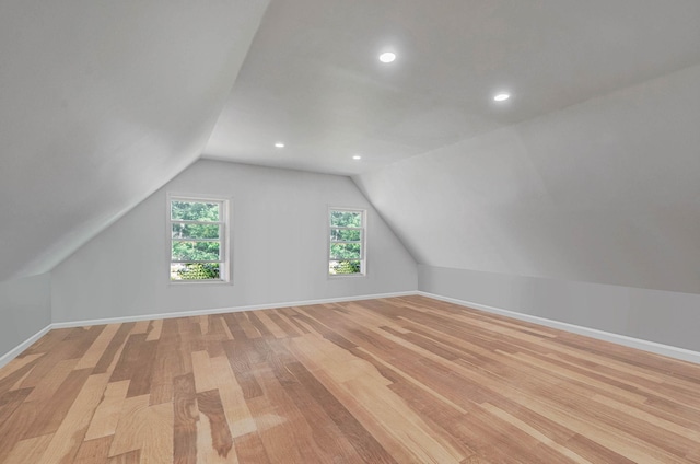27 Dana Ave, Mastic, NY 11950 - bonus room with light wood finished floors, lofted ceiling, and recessed lighting