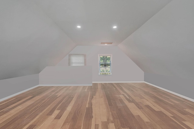 27 Dana Ave, Mastic, NY 11950 - bonus room with light wood finished floors, lofted ceiling, and recessed lighting
