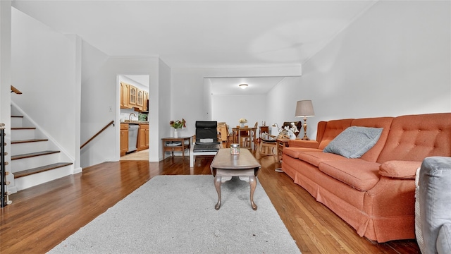 7 Kings Ln, Montrose, NY 10548 - living area with wood finished floors, stairway, and crown molding