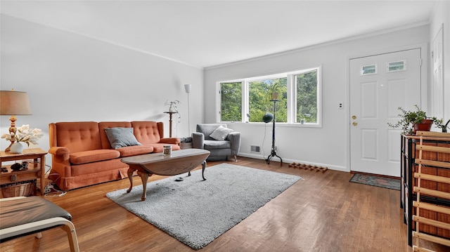 7 Kings Ln, Montrose, NY 10548 - living room featuring ornamental molding and wood finished floors