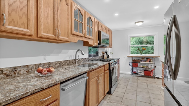 7 Kings Ln, Montrose, NY 10548 - kitchen with appliances with stainless steel finishes, ornamental molding, stone countertops, glass insert cabinets, and light tile patterned floors