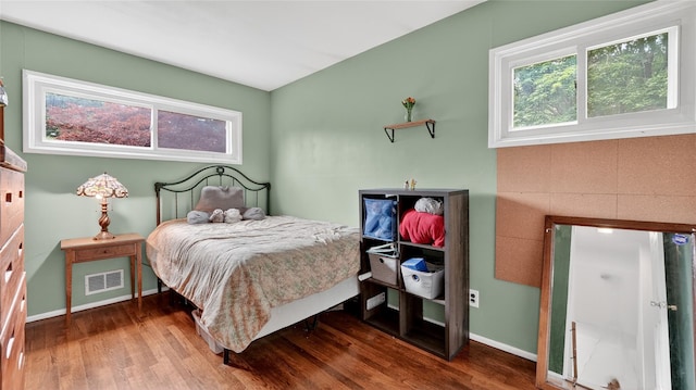 7 Kings Ln, Montrose, NY 10548 - bedroom featuring multiple windows and wood finished floors